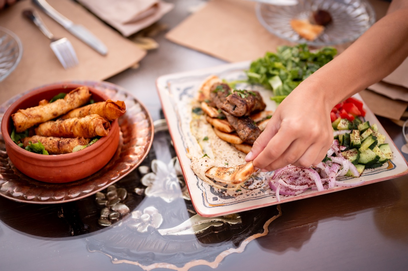 Meze and grilled items served on a shared table